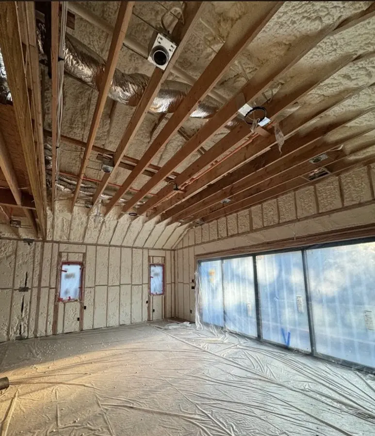 Interior walls and ceiling insulated with spray foam during new construction in McKinney